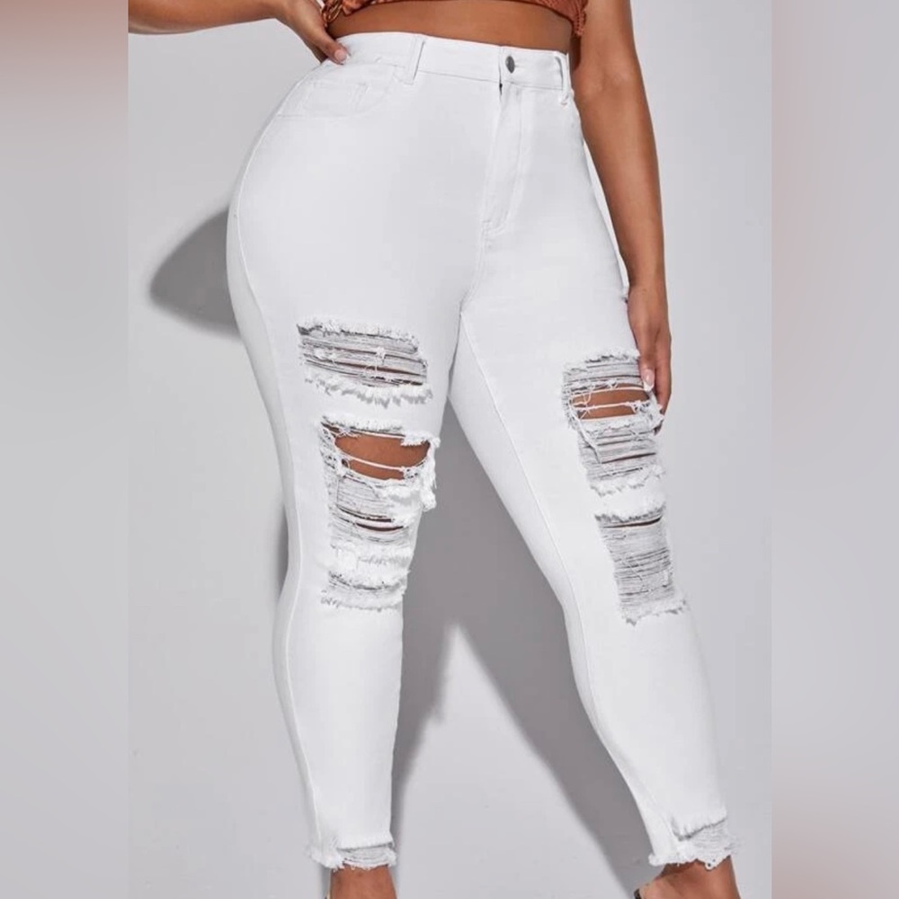 AMERICAN EAGLE SIZE 6  white holy jegging jeans